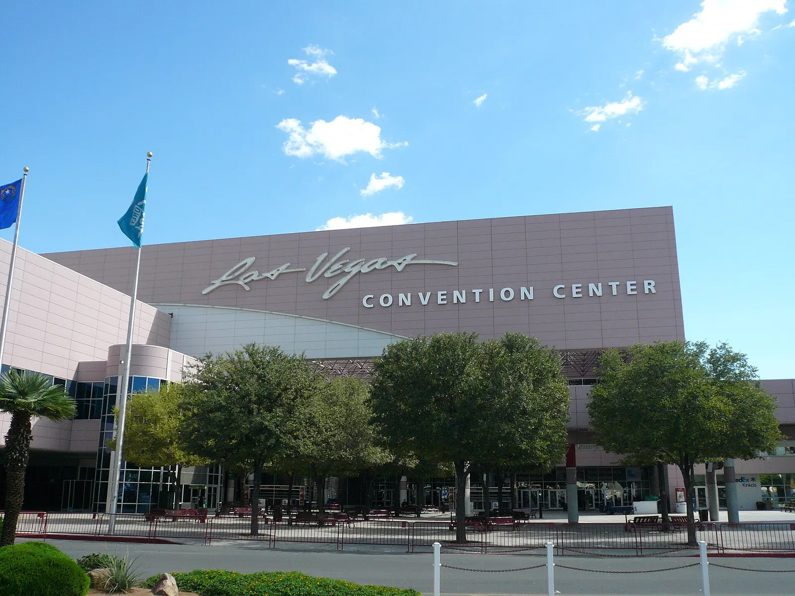 The Las Vegas Convention Center's facade with its script 'Las Vegas Convention Center' sign