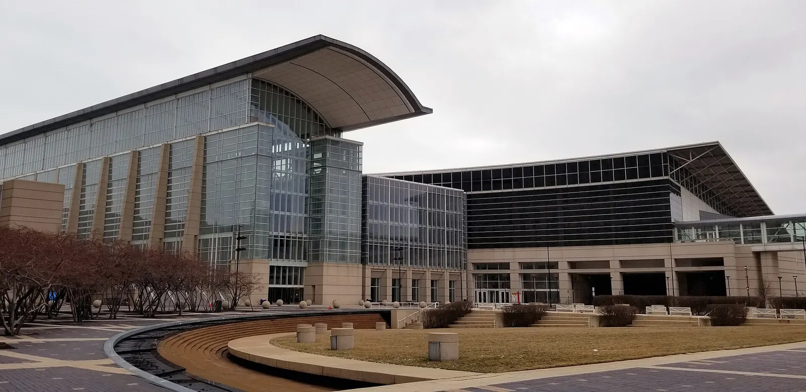 The glass South Building of McCormick Place with its curved roof canopy