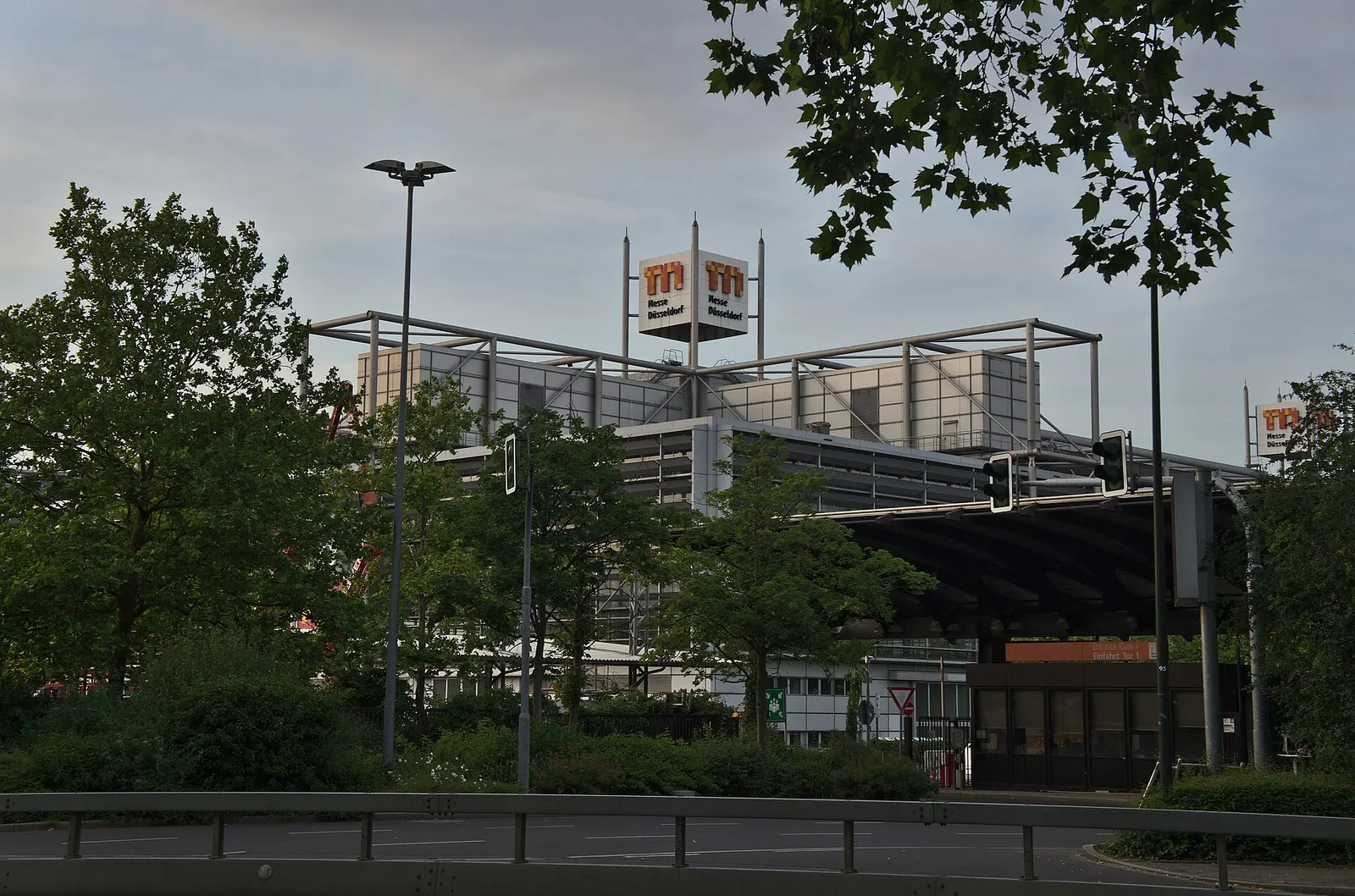 Messe Düsseldorf halls by Entrance Gate 1, with the fair's 'm' logo pylon