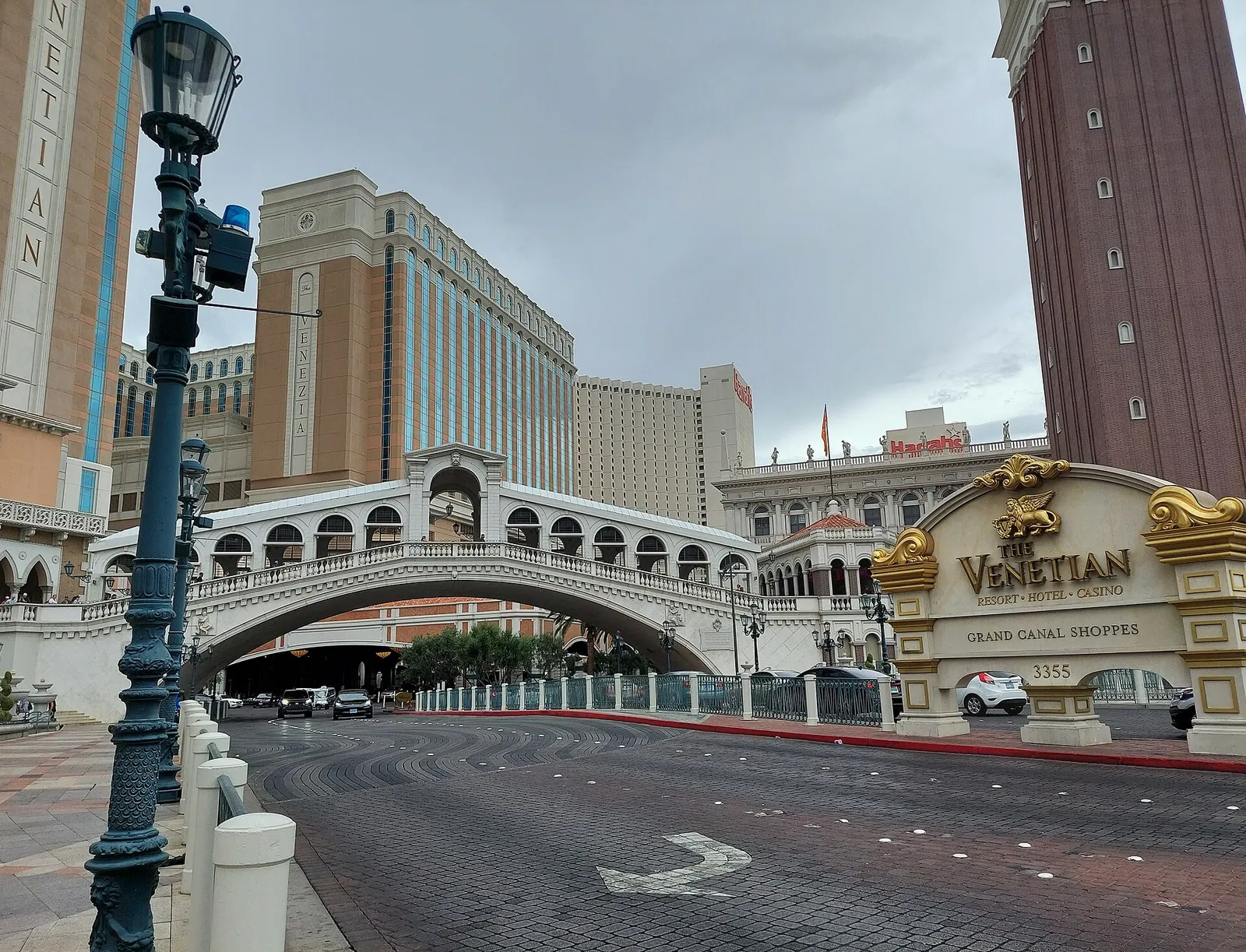 The Rialto Bridge replica and campanile at the front of The Venetian Las Vegas, with the Venetian sign